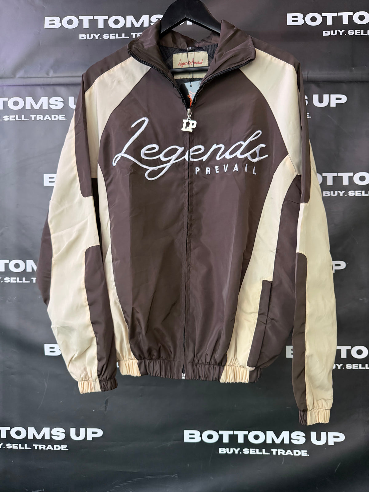 Legends Prevail Windbreaker Set In Brown