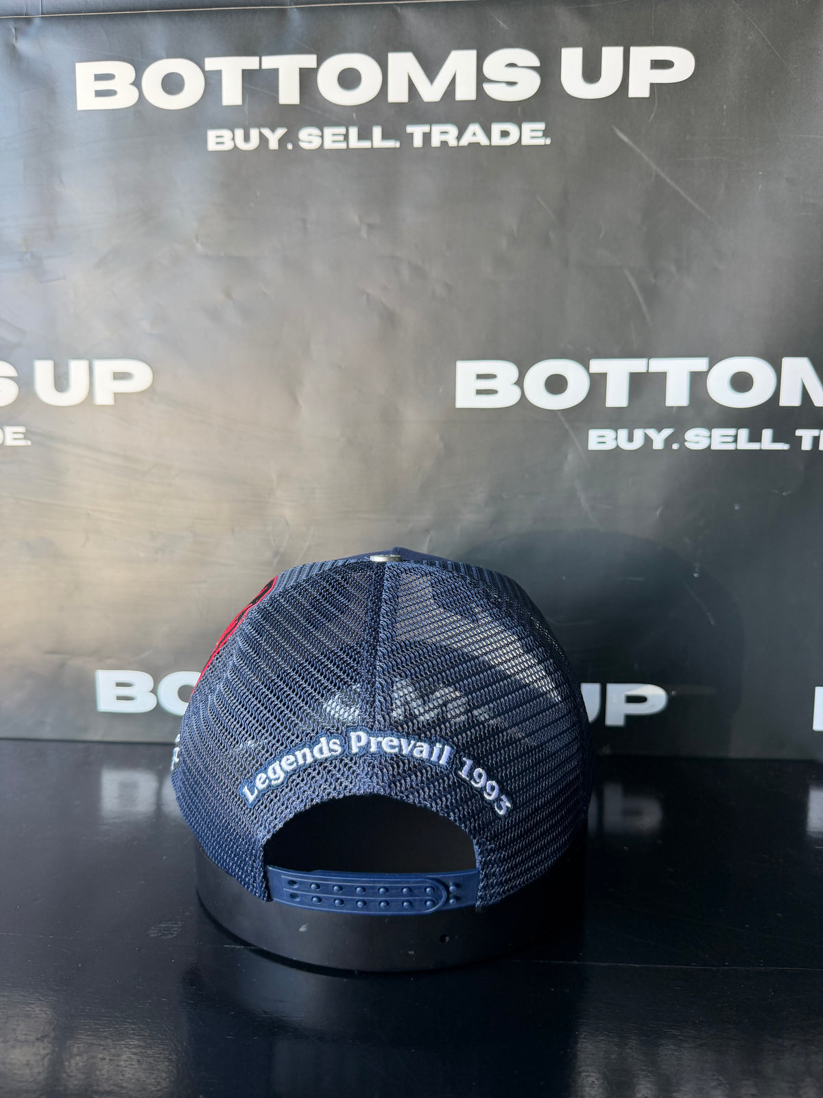 Legends Prevail x LOX Trucker Hat In Navy Blue