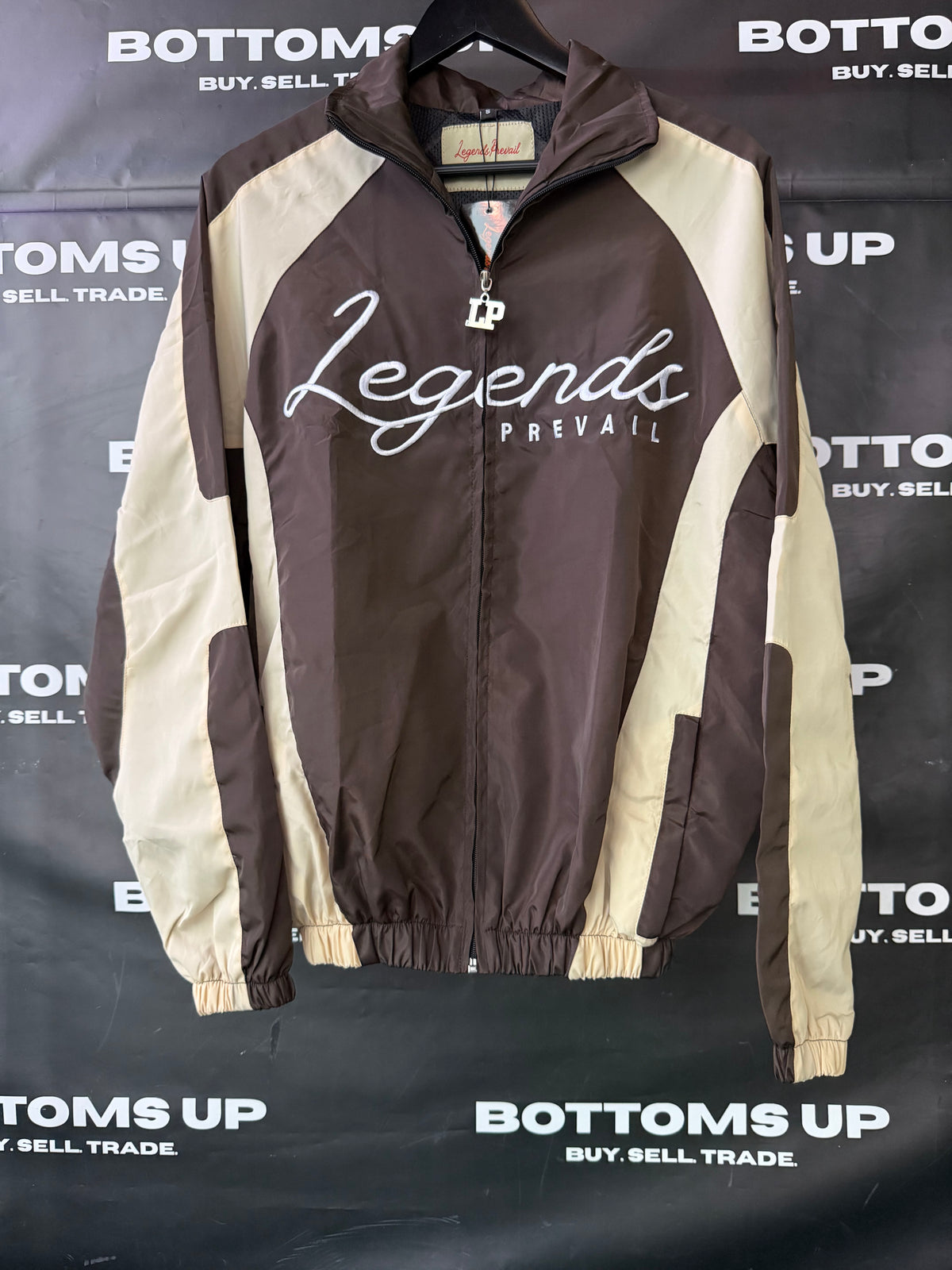 Legends Prevail Windbreaker Set In Brown