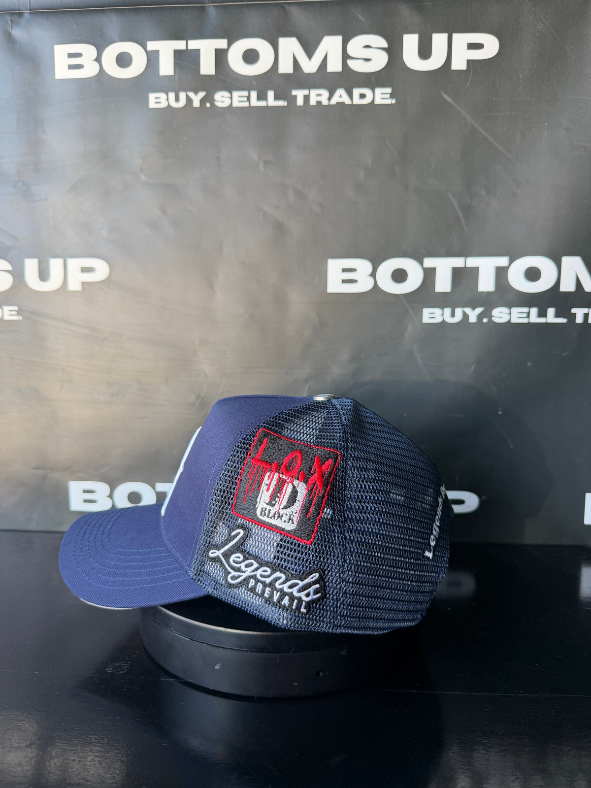 Legends Prevail x LOX Trucker Hat In Navy Blue