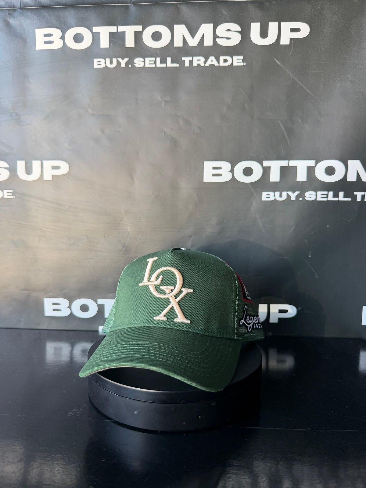 Legends Prevail x LOX Trucker Hat In Green