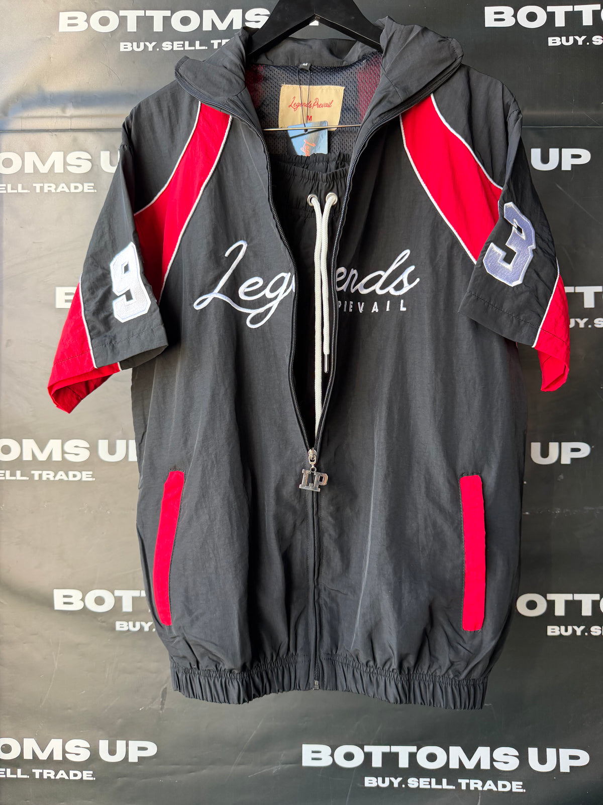 Legends Prevail Short Sleeve Windbreaker Set In Black / Red