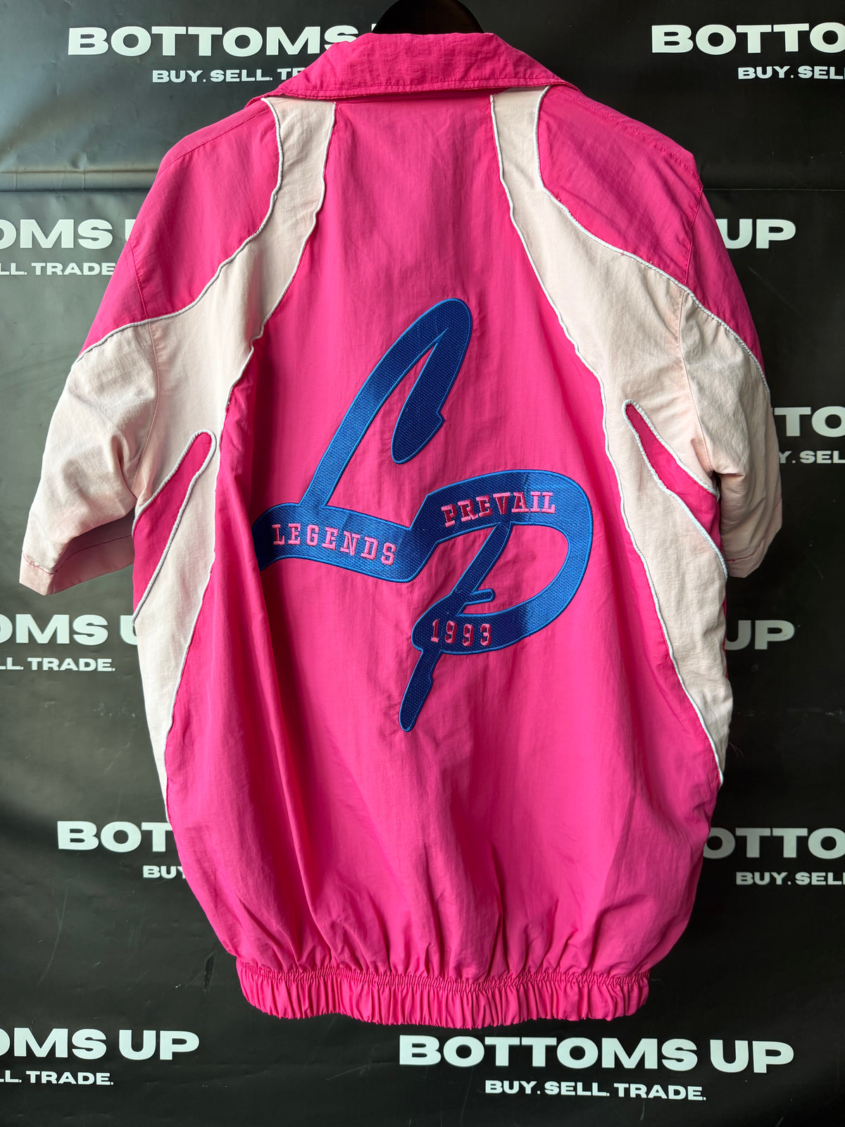 Legends Prevail Short Sleeve Windbreaker Set In Hot Pink