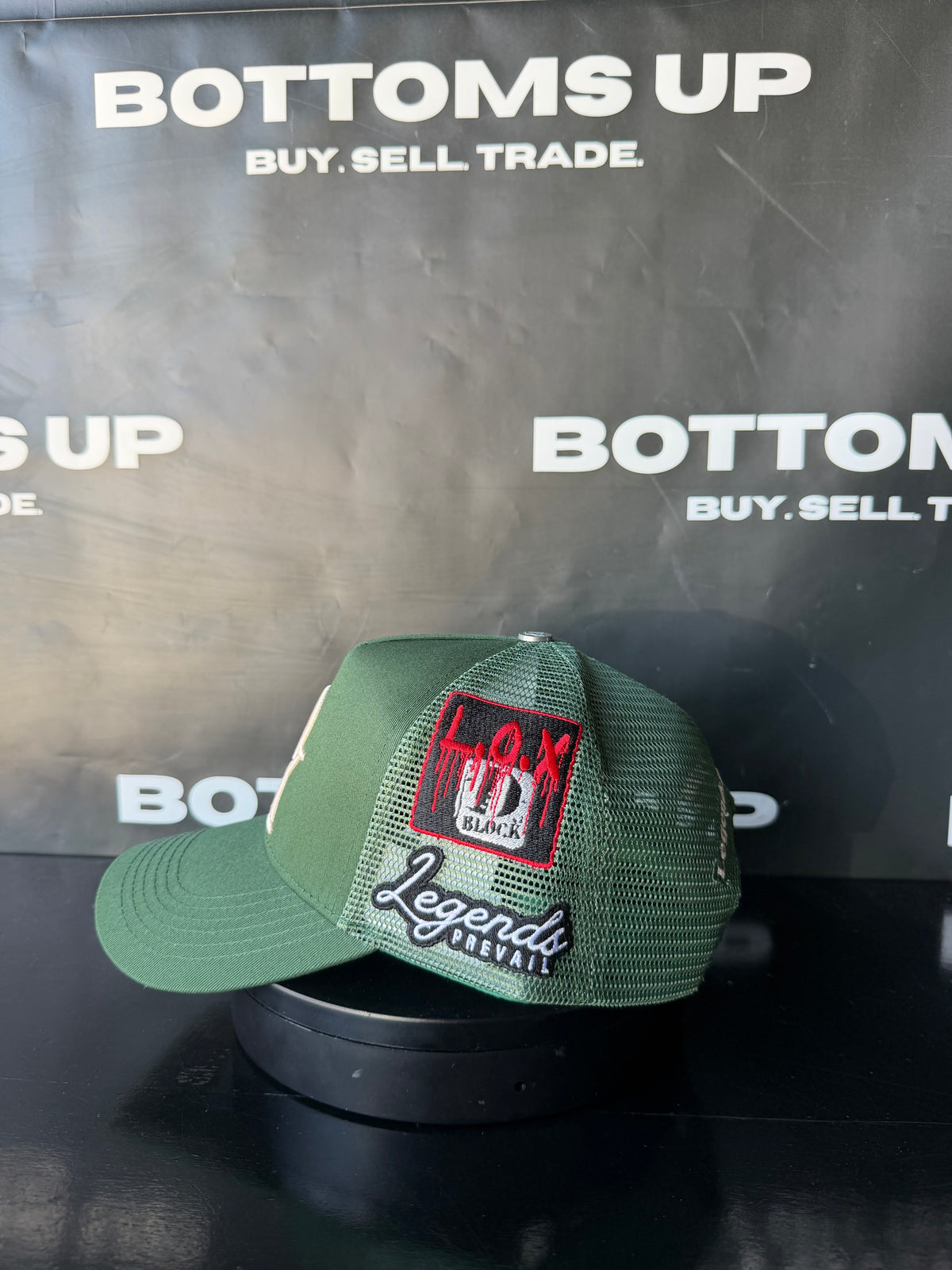 Legends Prevail x LOX Trucker Hat In Green