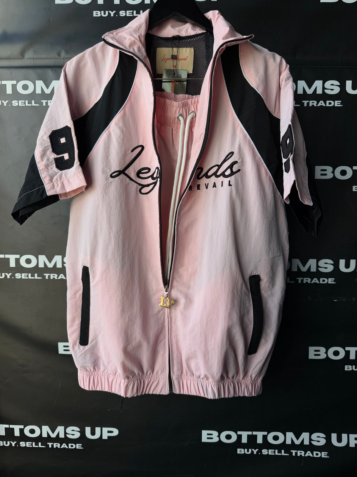 Legends Prevail Short Sleeve Windbreaker Set In Soft Pink