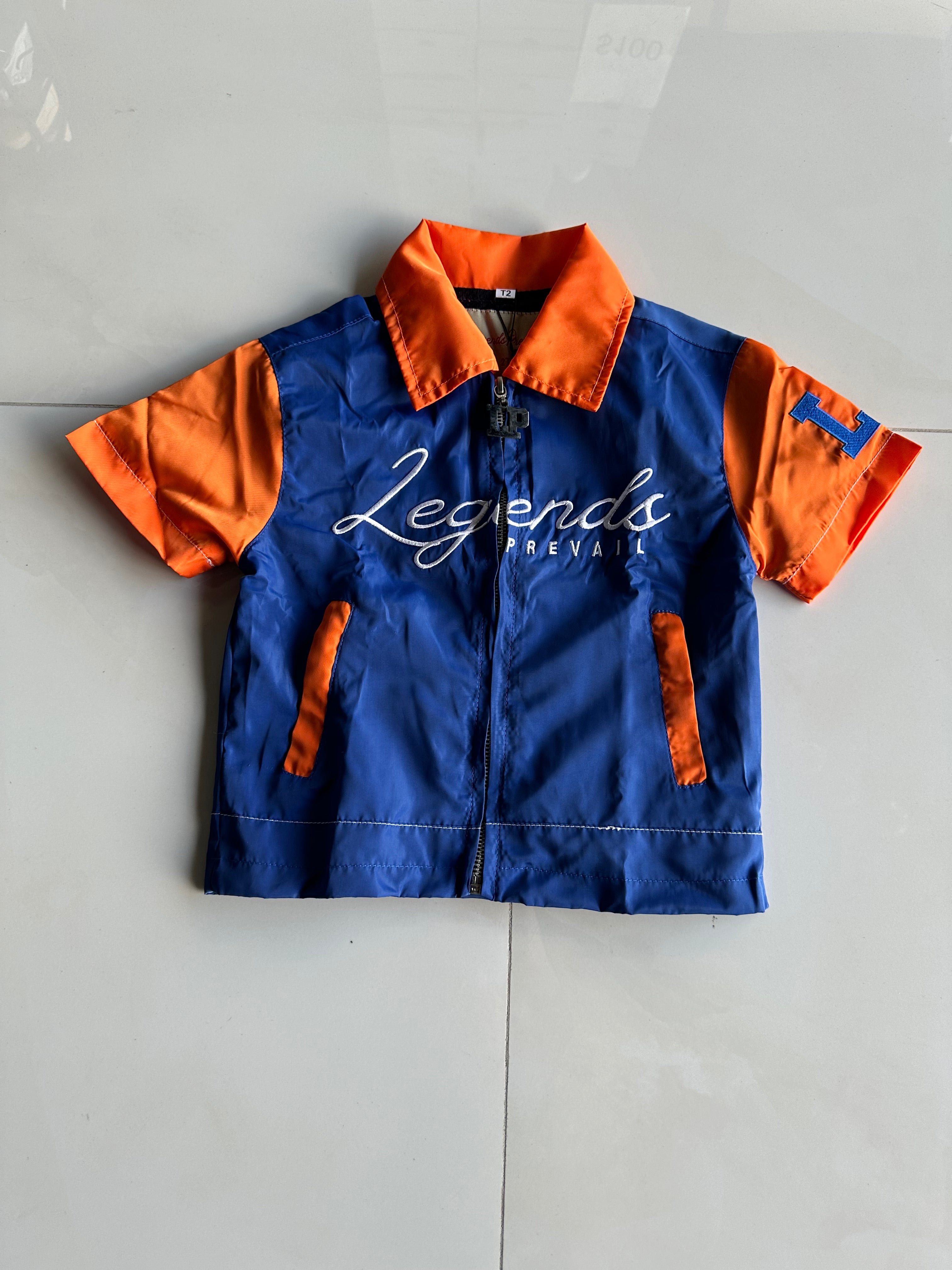Legends Prevail Kids Short Sleeve Windbreaker Set In Orange/Blue
