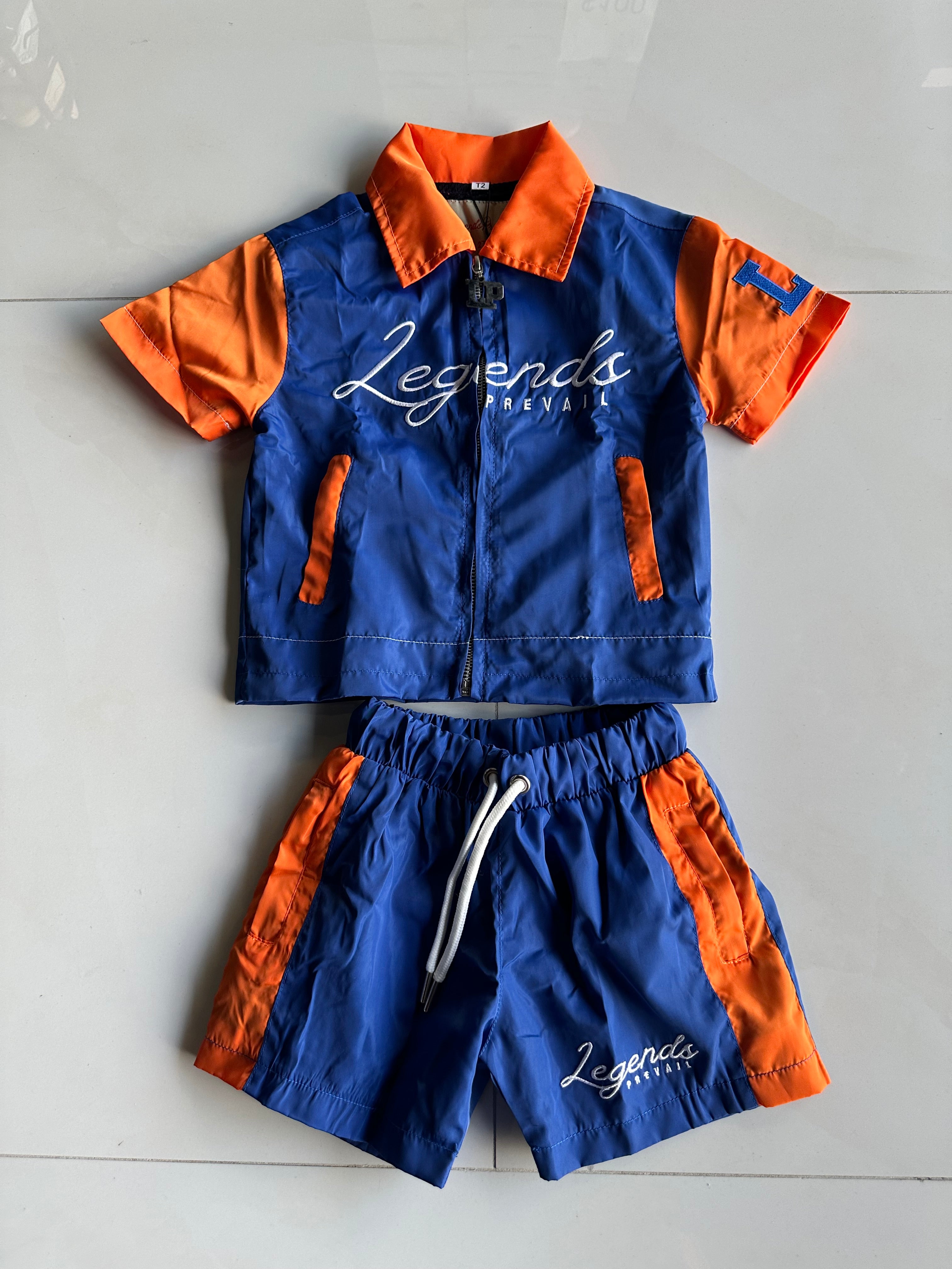 Legends Prevail Kids Short Sleeve Windbreaker Set In Orange/Blue