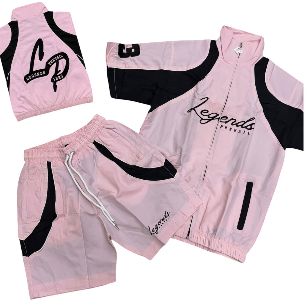 Legends Prevail Short Sleeve Windbreaker Set In Soft Pink